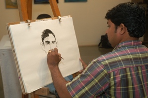 Cartoon painting demonstration by Manoj Salunkhe at Artfest 09, Indiaart Gallery